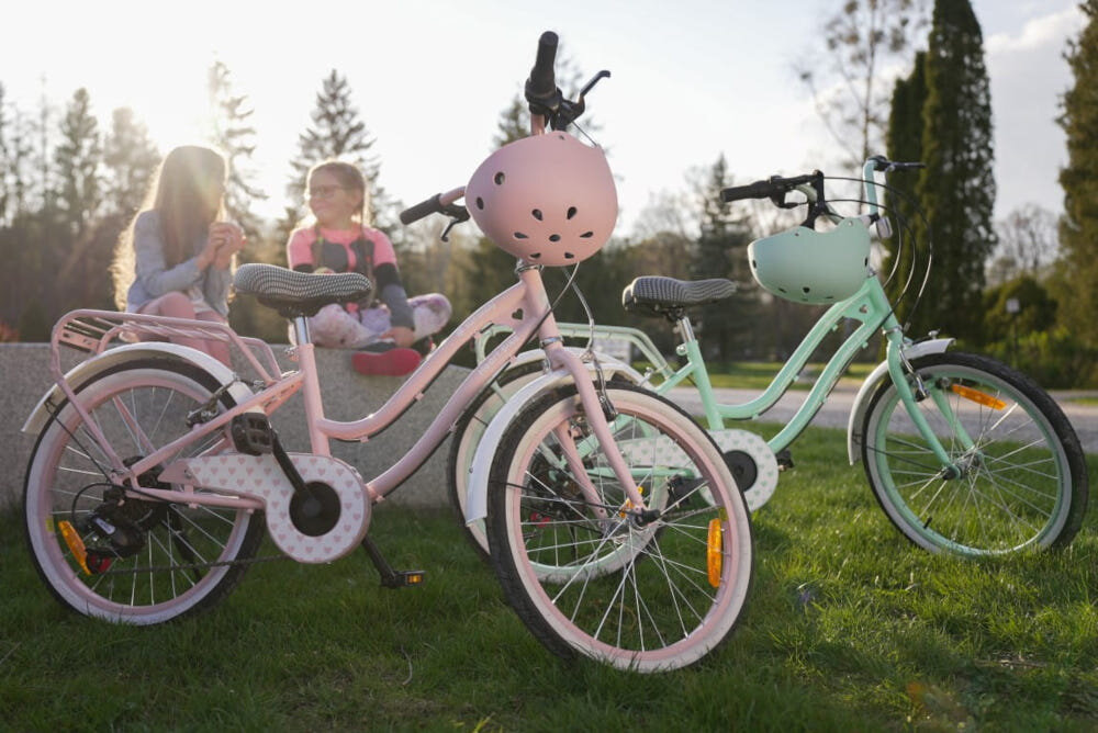 Rower dziecięcy SUN BABY Heart Bike 20 cali dla dziewczynki Różowy bagażnik stopka oczna stabilne podparcie pojazdu