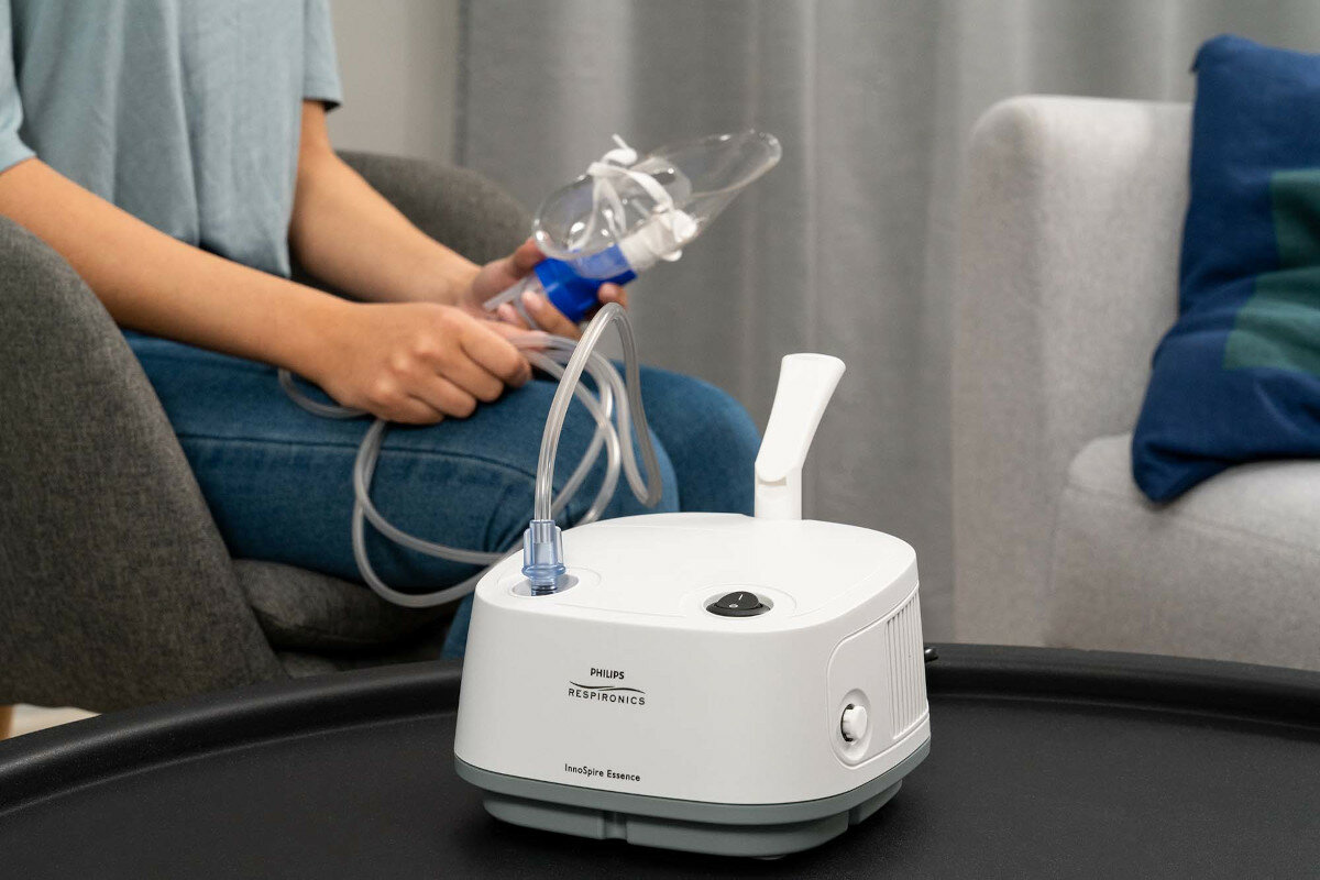 PHILIPS-Respironics oddychanie nebulizator inhalator technologia nebulizacja sidestream skuteczne leczenie zacisze własnego domu dla całej rodziny przeziębienie zapalenie oskrzeli niezawodność efekty leczenia szybka sprawna nebulizacja