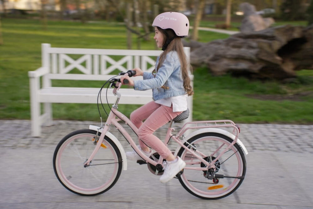 Rower dziecięcy SUN BABY Heart Bike 20 cali dla dziewczynki Różowy koła 20-calowe aluminiowe obręce błotniki w różowym kolorze regularne sprawdzanie ciśnienia powietrza wartość na bocznej części opony