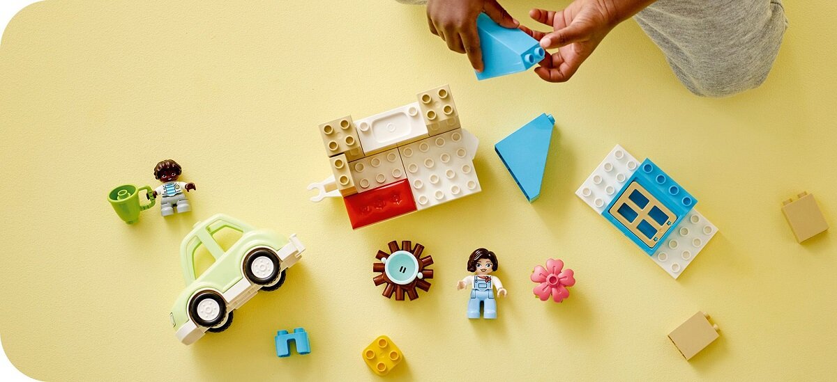 LEGO DUPLO Town Dom rodzinny na kółkach 10986 dziecko kreatywność zabawa nauka rozwój klocki figurki minifigurki jakość tradycja konstrukcja nauka wyobraźnia role jakość bezpieczeństwo wyobraźnia budowanie pasja hobby funkcje instrukcja aplikacja LEGO Builder