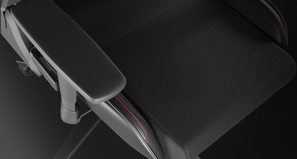 Fotel GENESIS Nitro 550 G2 Czarny Komfort wygoda regulacja podłokietniki poduszki sesje wielogodzinne kółka obciążenie mechanizm