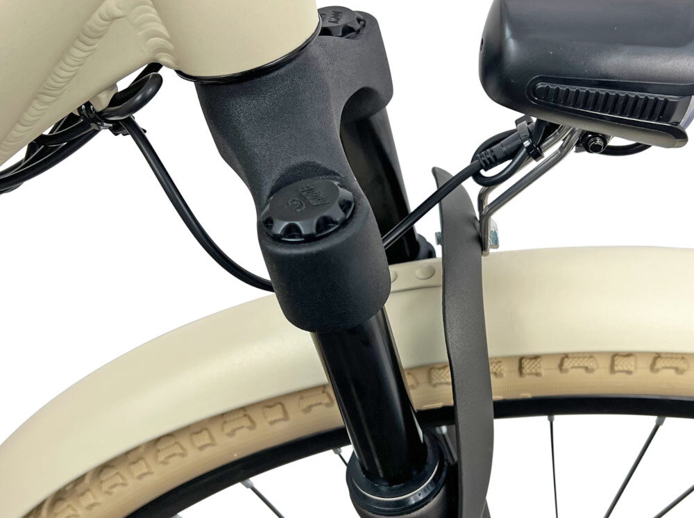 Rower elektryczny TORPADO Venere D18 28 cali damski Kremowy rower typu hardtail przedni amortyzator MODE typ MD-N7351 28 ulatwia najezdzaniw na przeszkody niweluje wstrzasy na kierownicy komfortowa jazda na nierownych nawierzchniach